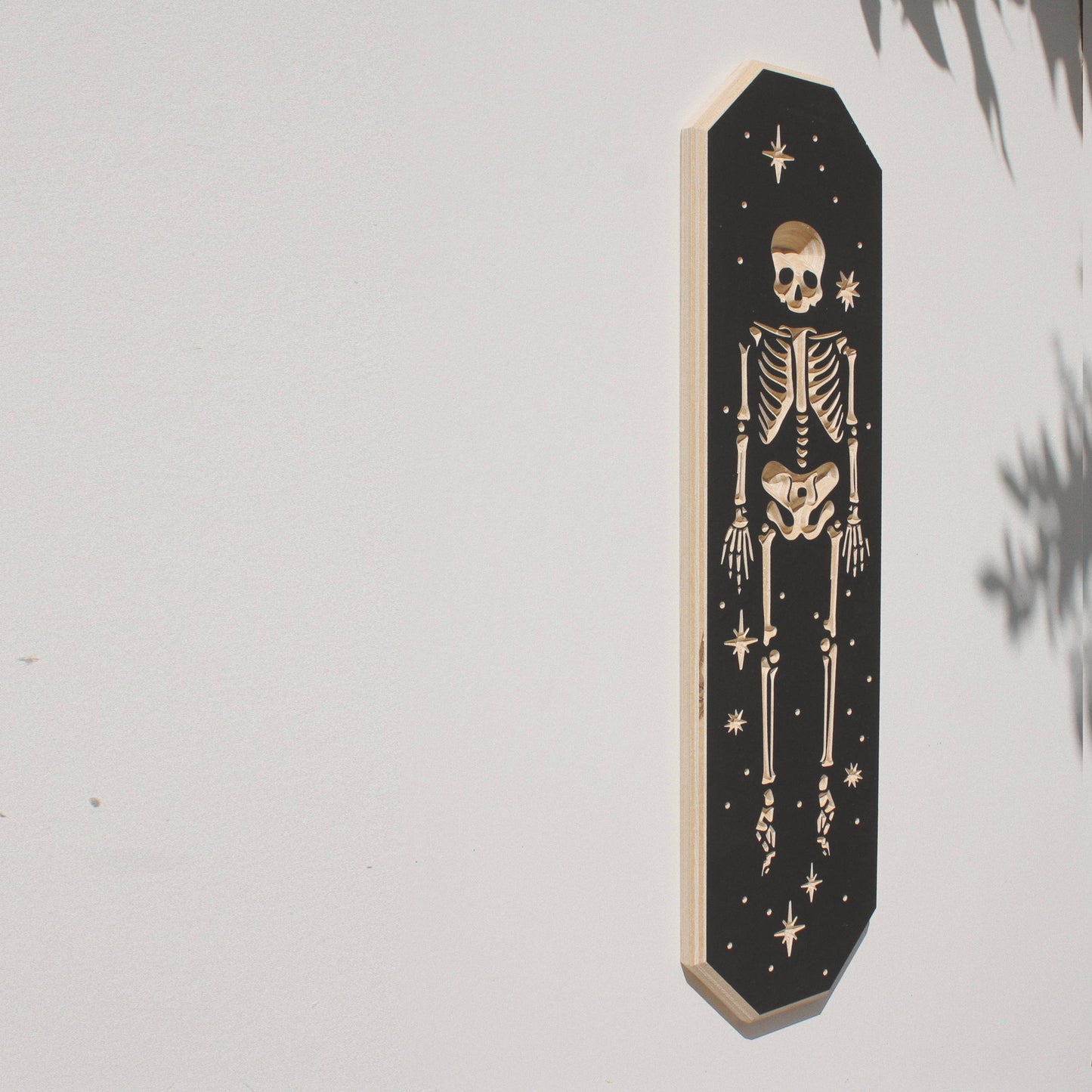 Carved Skeleton Wall Hanging