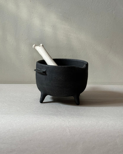 black ironstone ceramic mortar and pestle with ceramic bone shaped pestle